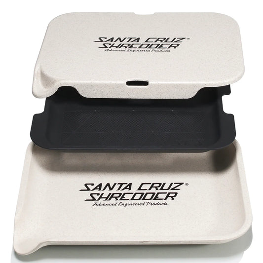 Santa Cruz Shredder with black top and beige base on a white background